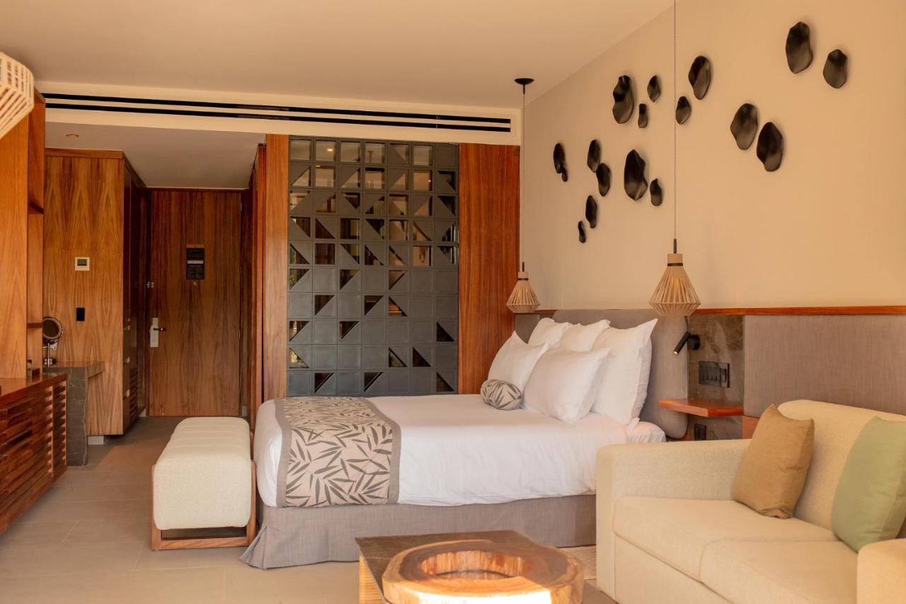 Suite Junior con vistas tropicales - cama extragrande