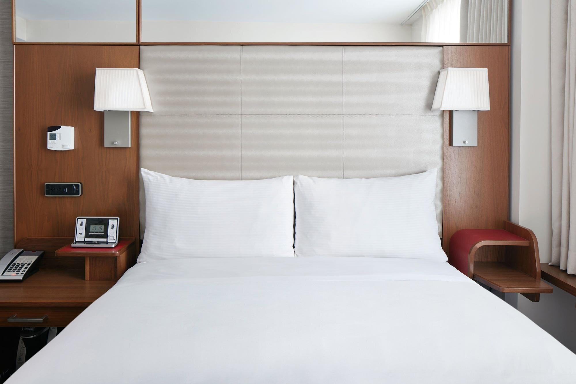 Petite Chambre Lit Queen-Size