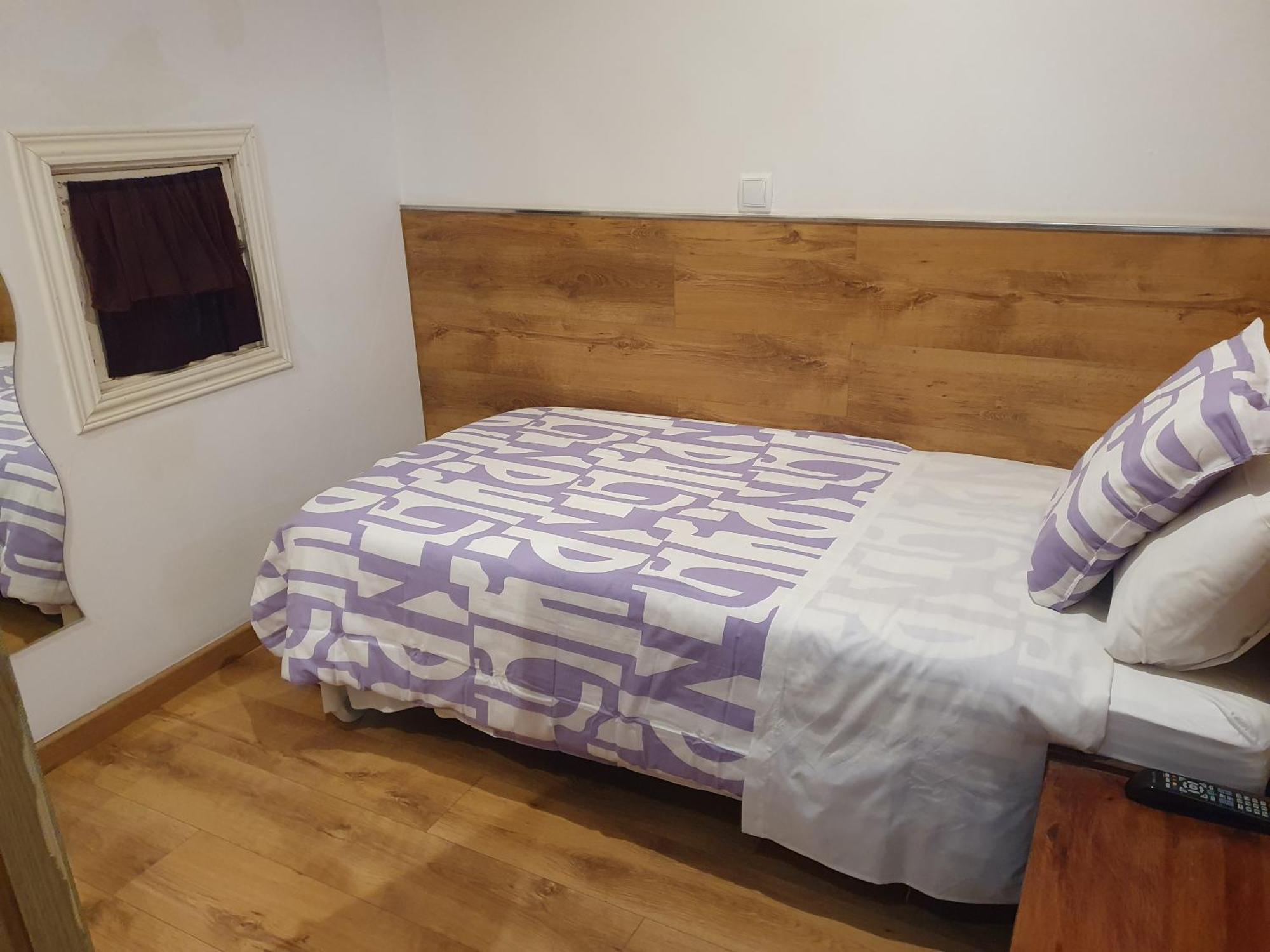 Camera Singola Budget con Bagno in Comune