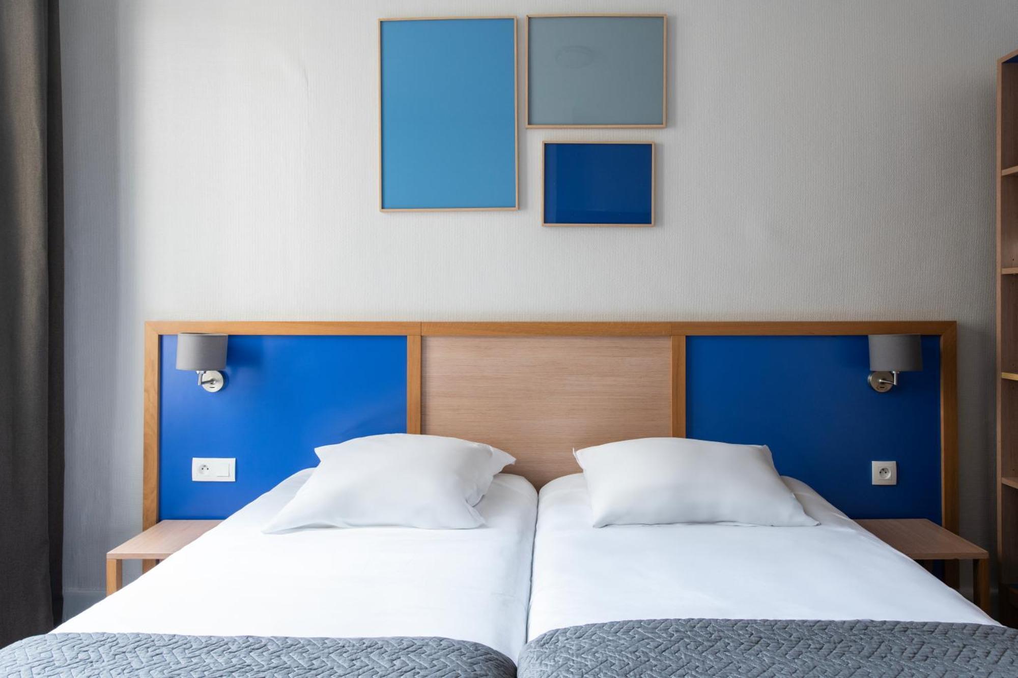 Quarto com 2 Camas de Solteiro