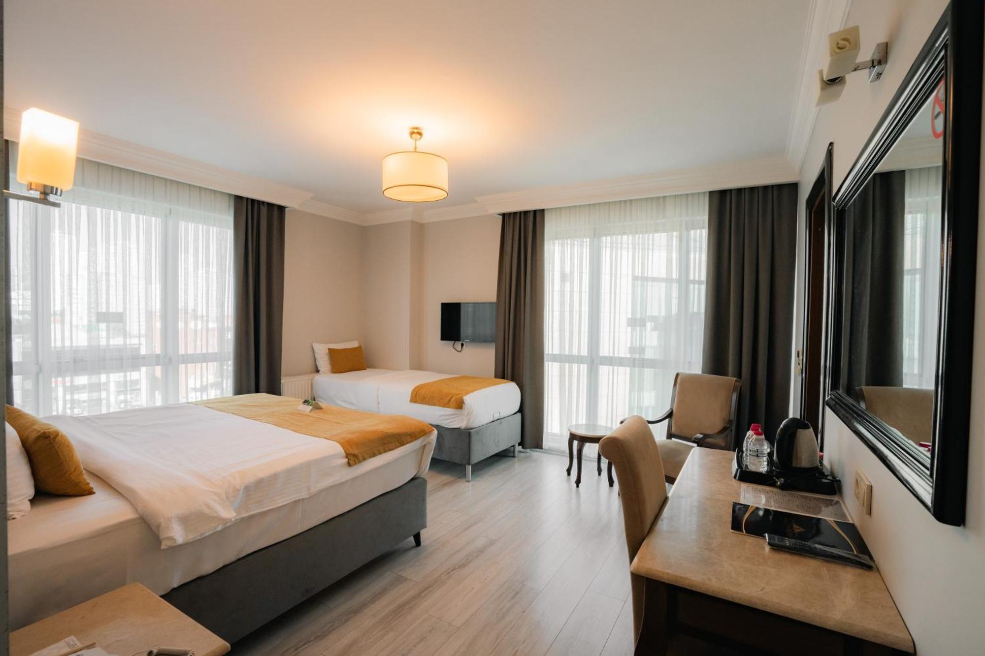 Deluxe Triple Room