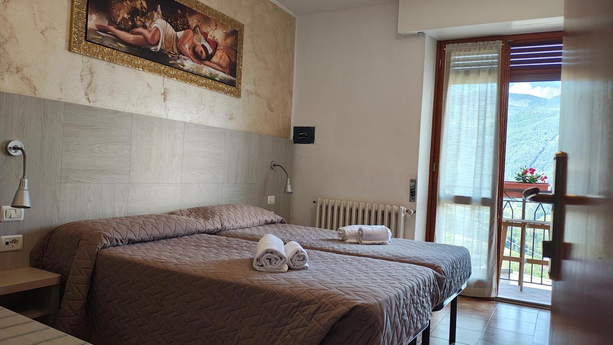 Camera Doppia con Letti Singoli