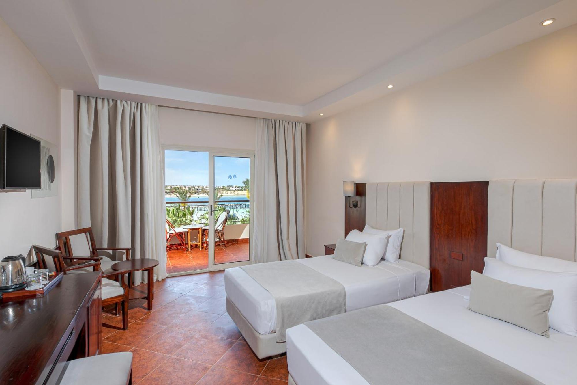 Deluxe Doppel-/Zweibettzimmer direkt am Strand
