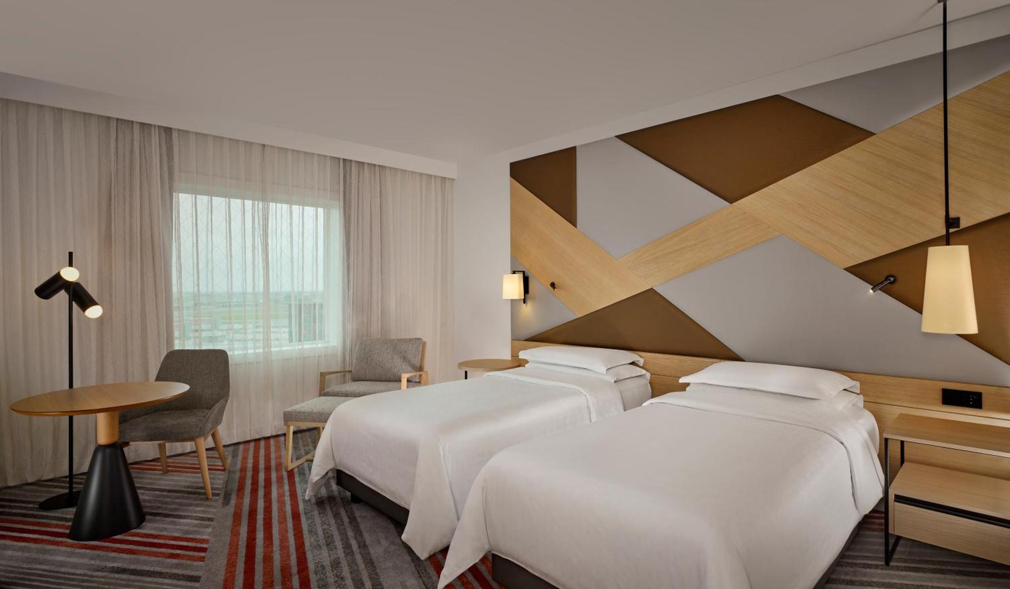 Deluxe Twin Room Two Twin Beds Airport View