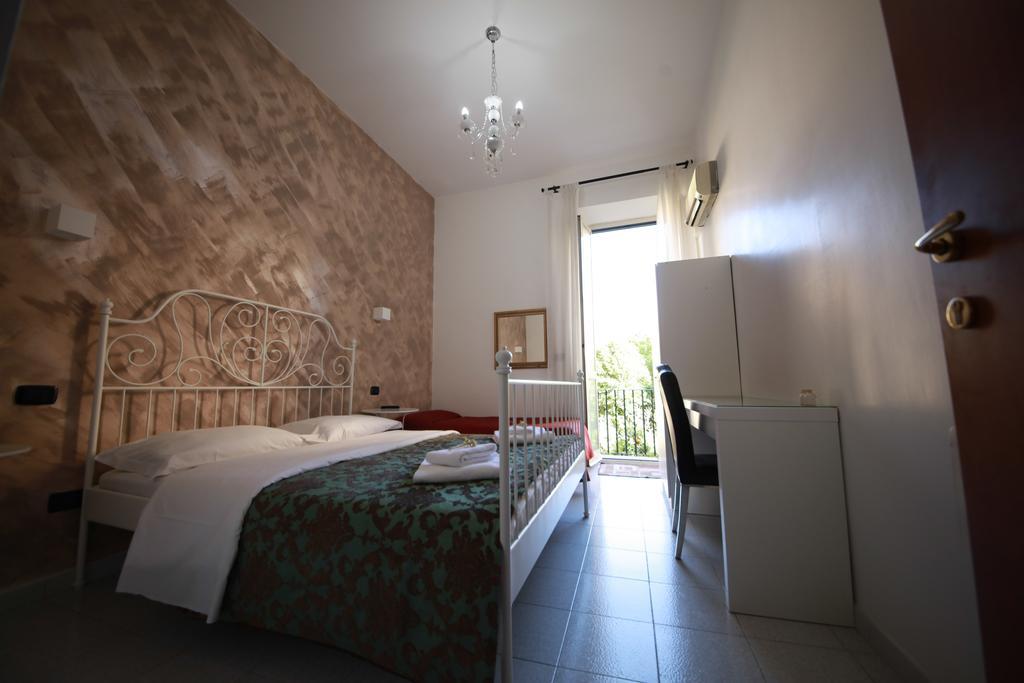 Quarto Triplo com Varanda
