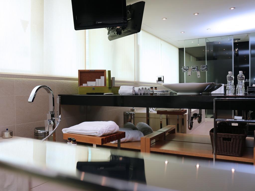 Habitación Premier con cama extragrande y bañera