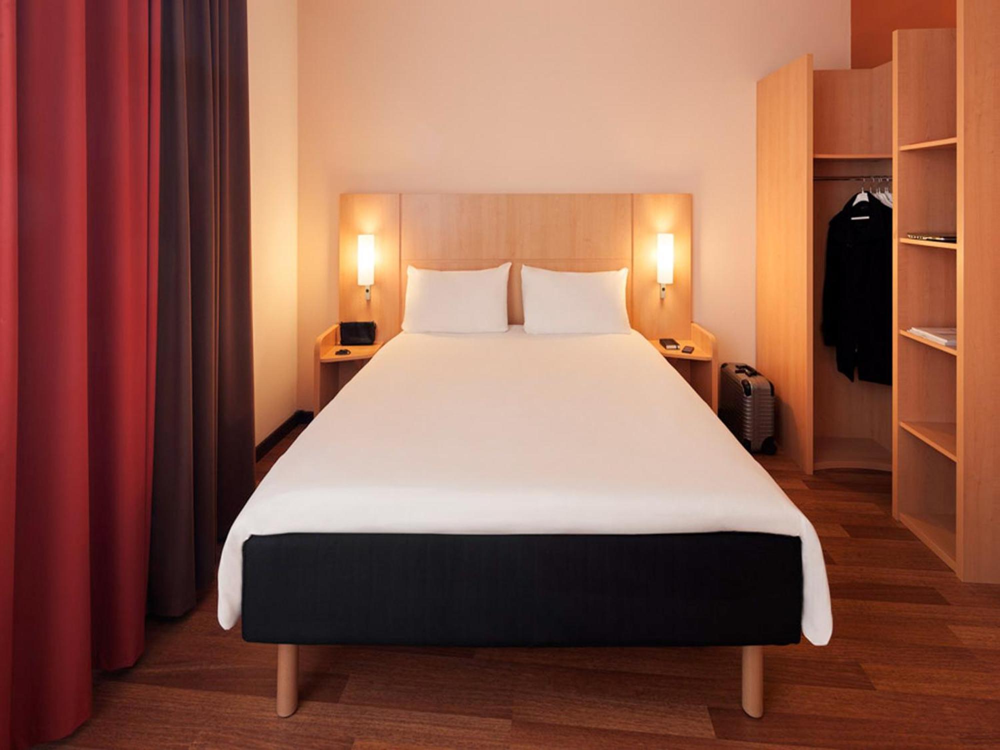 Room with One Double and One Single Bed