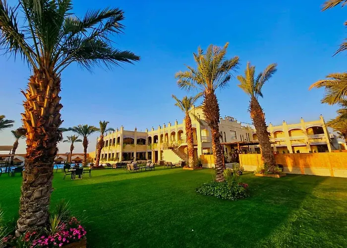 Qasr Alnkheel Resort And Hotel