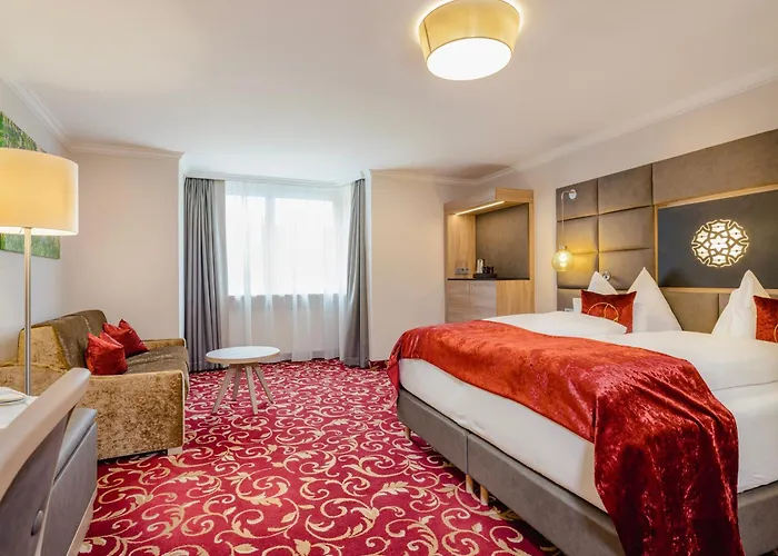 Hotel Norica - Thermenhotels Gastein mit dem Bademantel direkt in die Therme