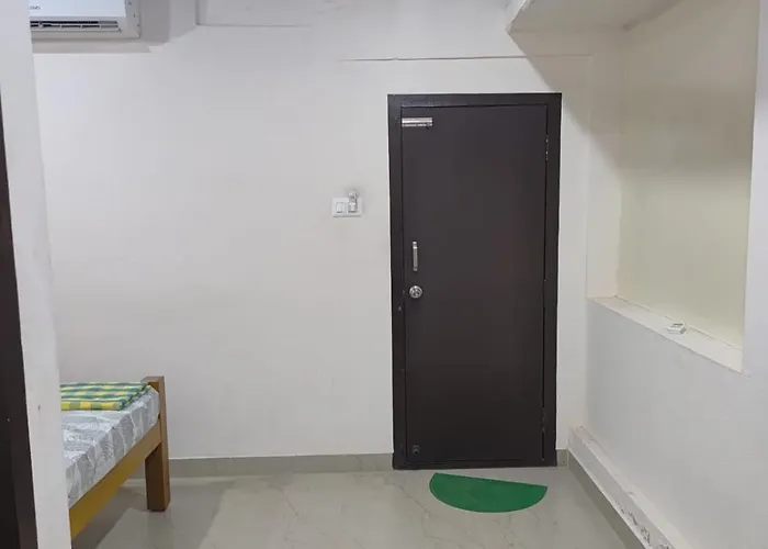Suvarna Tourist Home