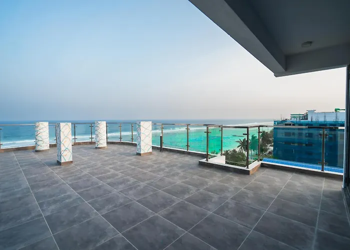Aina Residency Beachfront Hotel