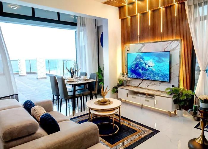 Aina Residency Beachfront Hotel