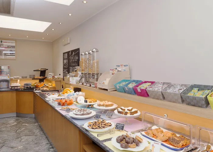 City Hotel & Suites