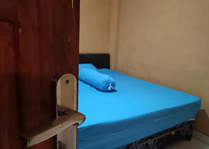 Oyo 93073 Penginapan 69
