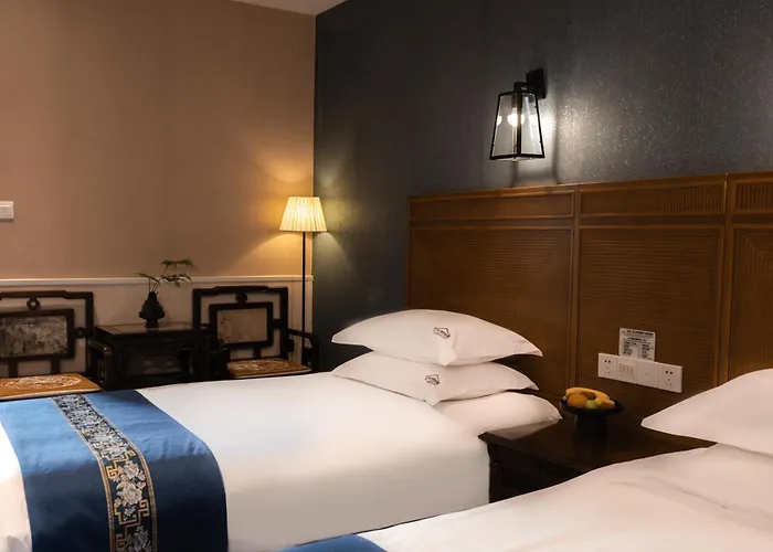 Wenjun Courtyard Hotel Chengdu ,English-Speaking , Pick-Up Service ,Laundry Service , Local Tours